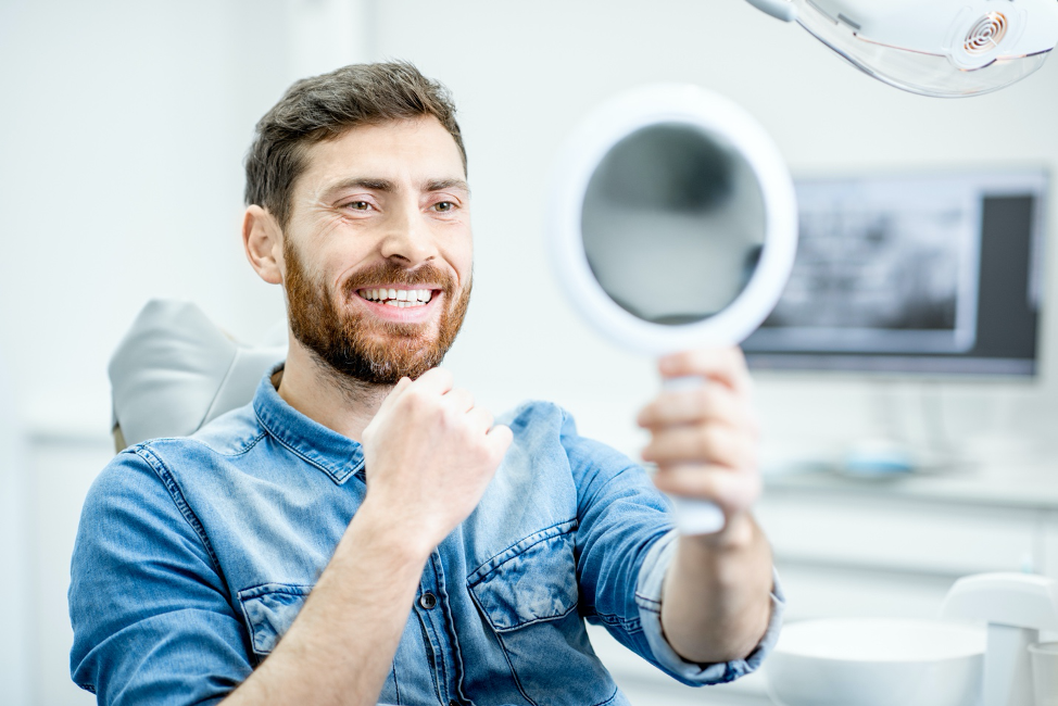 Guy Smiling After Teeth Whitening Proedure in New York City